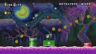 New Super Luigi UDer flinke Gamepad-Spieler kann seine Kameraden mit Plattformen vor dem tödlichen Absturz bewahren.