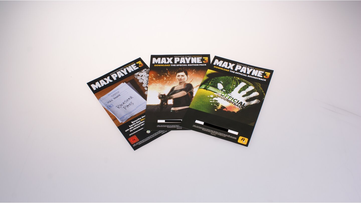 Max Payne 3 - Die Special Edition ausgepacktDie Download-Codes für Multiplayer-DLCs und den Soundtrack stehen auf schmucklosen Zettelchen.