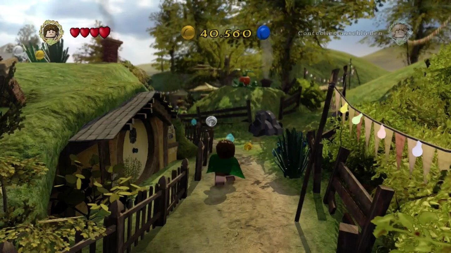 LEGO Der Herr der RingeFrodo auf dem Weg durchs Auenland. Die Heimat der Hobbits wirkt im Spiel genauso heimelig wie im Film.