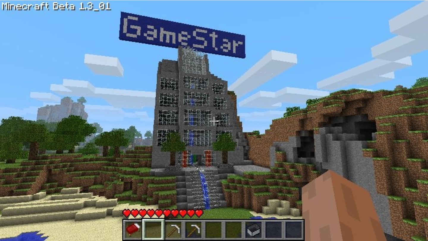 Minecraft - Interaktiv-WettbewerbEin riesiger GameStar-Schriftzug krönt das Stein-Glas-Konstrukt von Daniel Wegener. Durch die Hausmitte rauscht ein Wasserfall.