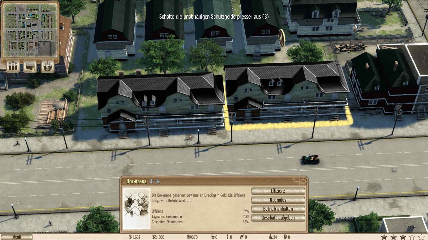 Omerta: City of GangstersUnsere Box-Arena (rechts) sieht haargenauso aus wie das benachbarte Wohnhaus (links).