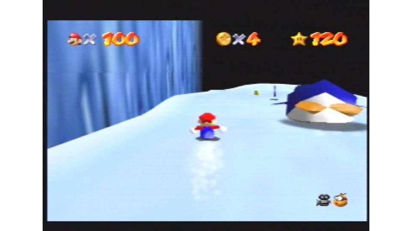 Mario races a rotund penguin down an icy ramp.