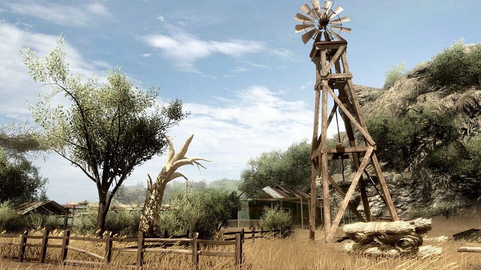 Den größten Teil der Welt von Far Cry 2 macht die afrikanische Savanne mit ihrem sich sanft wiegenden Gras und den vereinzelten noch grünen Bäumen aus.