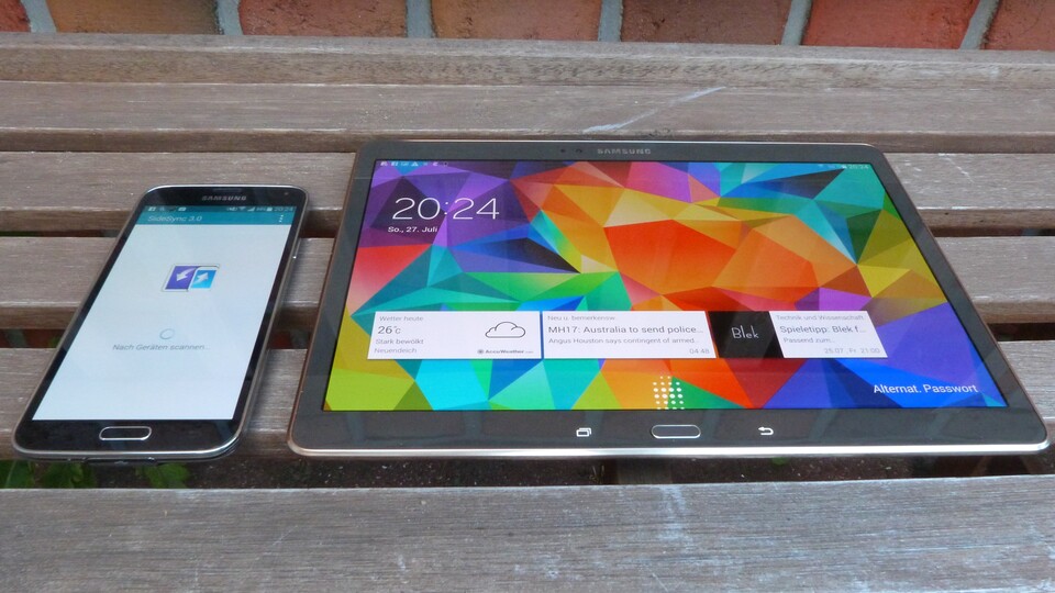 Mit SideSync lässt sich das Tablet mit einem Galaxy S5 verbinden - sogar Telefonate über das Tablet sind so möglich. Wirkliche sinnvolle Einsatzszenarien sind uns dafür aber bisher nicht eingefallen.
