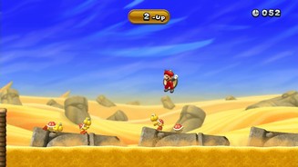 New Super Mario Bros. UZack! Dank Flughörnchen-Kostüm überraschen wir die Koopas von oben.
