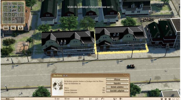 Omerta: City of GangstersUnsere Box-Arena (rechts) sieht haargenauso aus wie das benachbarte Wohnhaus (links).