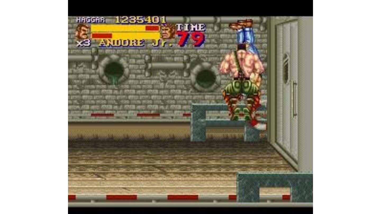 Haggar performing a spinning pile driver