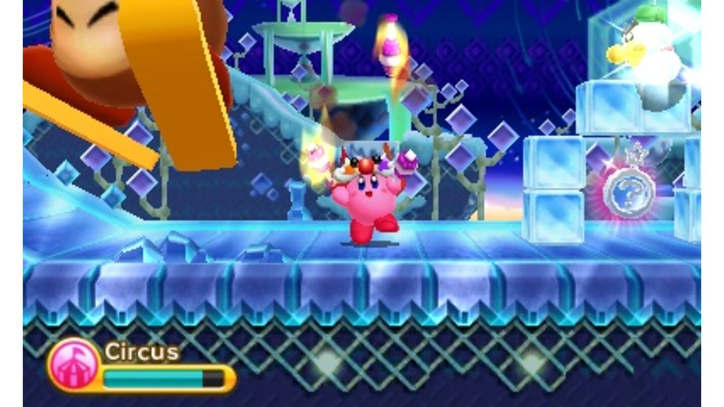 Kirby Triple DeluxeHier jongliert Kirby mit brennenden Kegeln.