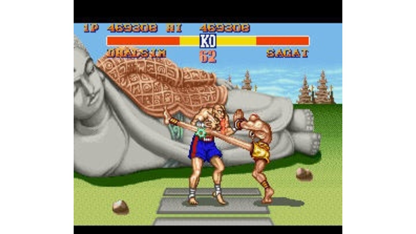 Third boss Sagat discovers that Dhalsim's legs are pretty long