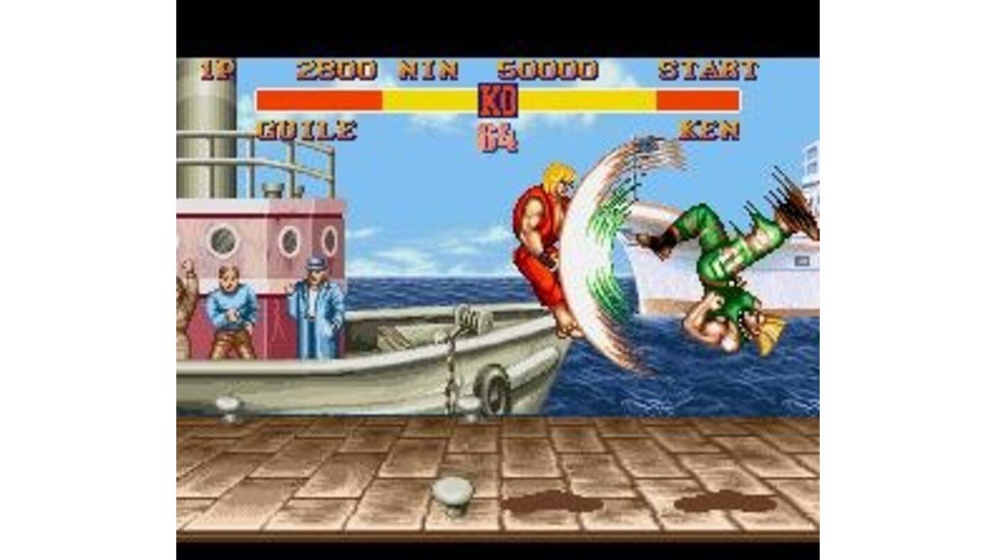The impact moment is close: in instants, Ken will feel Guile's Flash Kick power size!