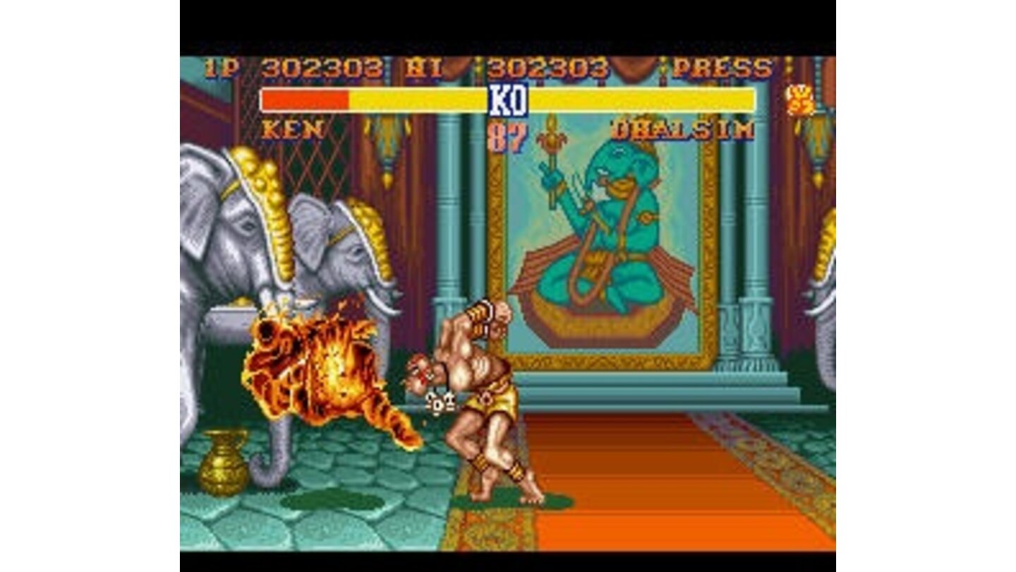 Dhalsim sets Ken on fire with his yoga flame