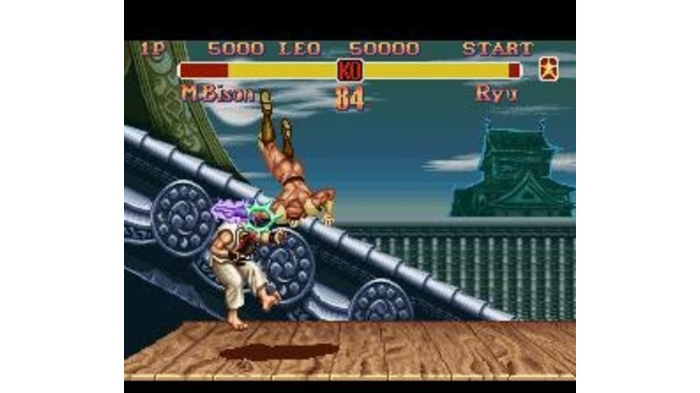 Ryu being damaged by M. Bison's Flying Psycho Fist.