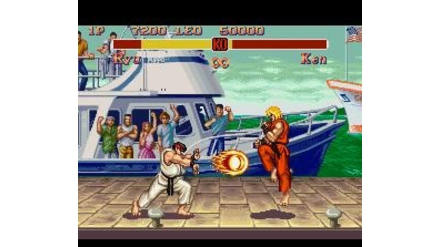 Ryu uses his new flaming Hadouken against Ken, that quickly makes an evading jump.