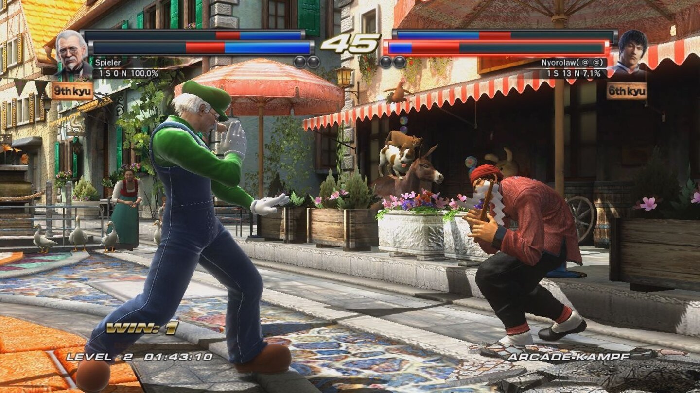 Tekken Tag Tournament 2 (Wii U)Im Hintergrund der Deutschland-Stage »Historic Town Square«, tummeln sich die Bremer Stadtmusikanten.