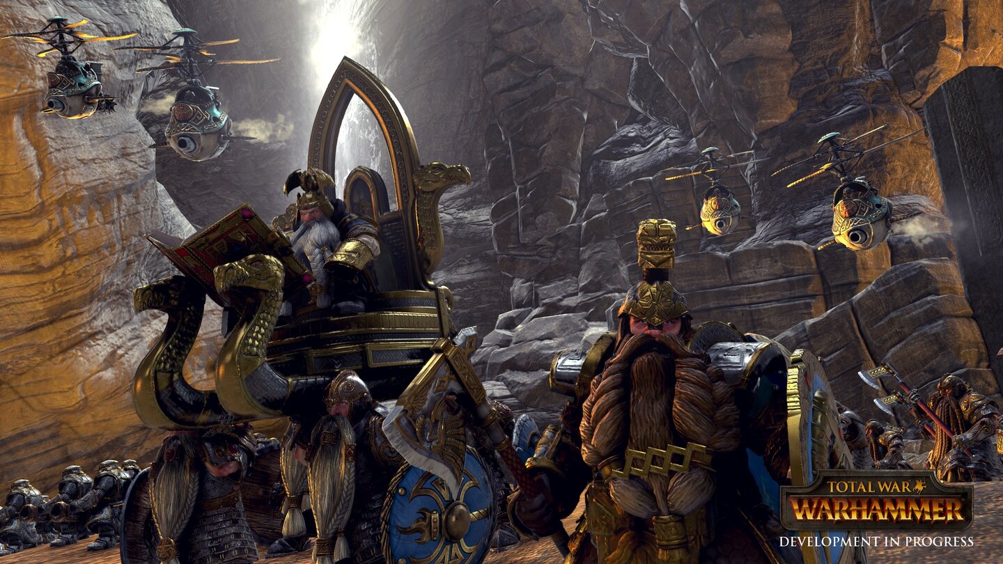 Total War: WarhammerZwergenmonarch Thorgrim Grollbart lässt sich auf seinem Thron in die Schlacht tragen und liest zwischendurch aus einem Buch aller Ungerechtigkeiten gegen sein Volk.