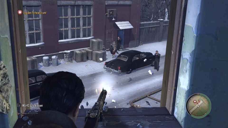 Mafia 2(PC): Überraschung! Mit schwerem Geschütz ballern wir aus dem Hinterhalt auf feindliche Mafiosi.