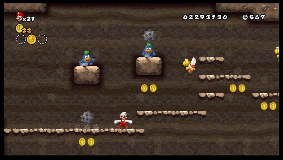 New Super Mario Bros. Wii: In der Bergwelt muss sich der Klempner unter anderem an schmalen Wänden entlang drücken und Felsen ausweichen. 