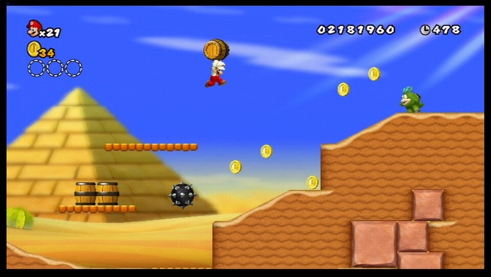 New Super Mario Bros. Wii: Diesem fiesen grünen Widersacher in der Wüstenwelt kommt man am besten mit einem Holzfass bei 