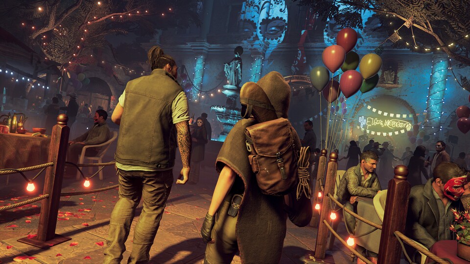 Zu Beginn der Demo schleichen sich Lara und Jonah durch Feierlichkeiten des Dia de los Muertos.