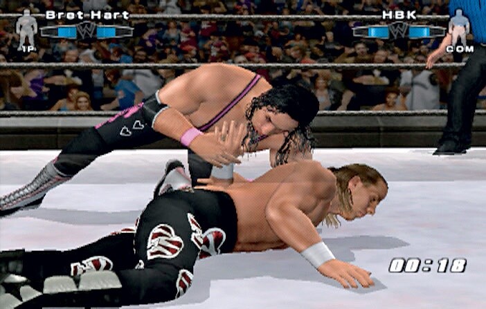 Rache für den Betrug bei der Survivor Series 1997: WWE-Legende Bret »Hitman« Hart kämpft den »Heartbreak Kid« Shawn Michaels unnachgiebig zu Boden. Screen: PS2