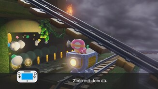 Captain Toad: Treasure TrackerDie Lorenfahrten sehen wir auf dem GamePad aus der Egoperspektive, während wir per Fadenkreuz mit Rüben ballern.