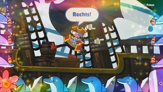 Game + WarioEine Riesenkrake, tanzende Delfine, fliegende Fische, Regenbögen und Glitzersterne? Klingt ganz nach Game + Wario!