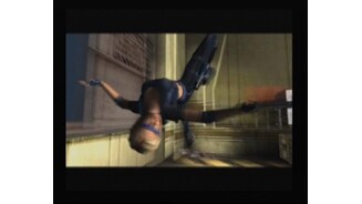 Nikkis pulling a stunt to dodge the rain of an incoming bullets