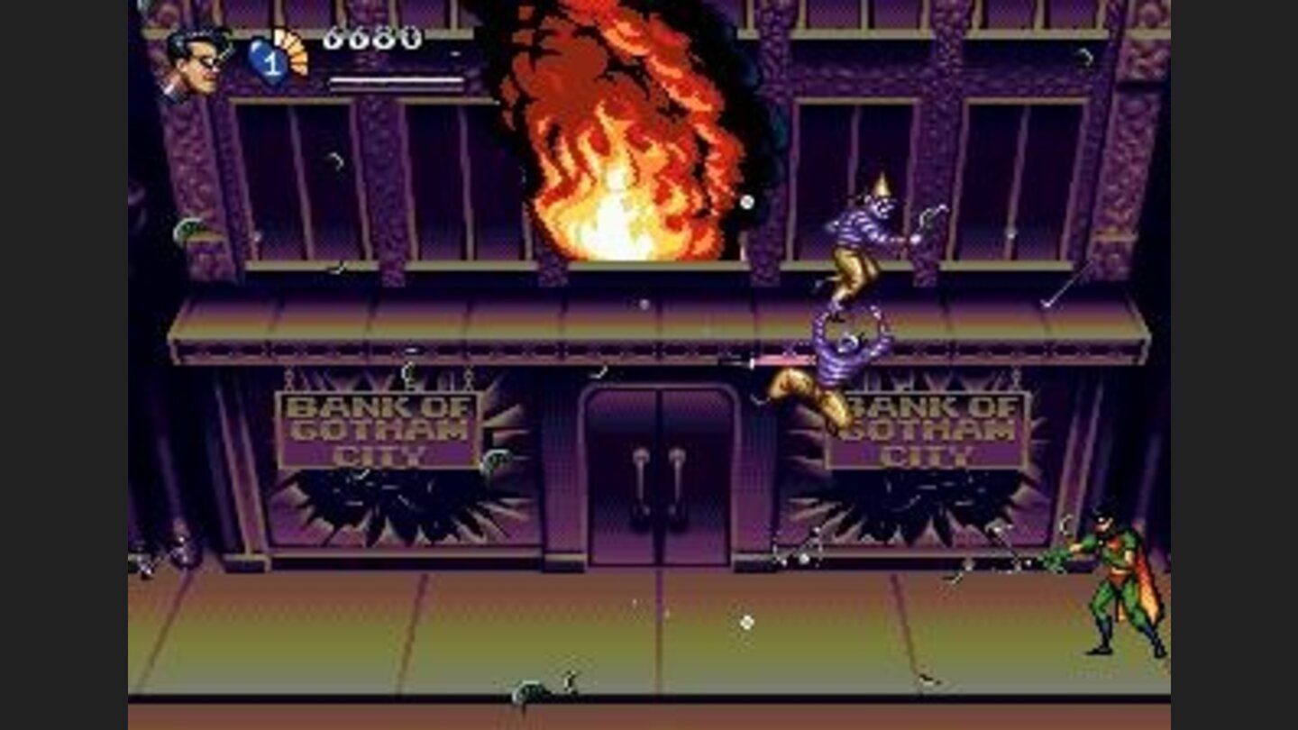 Robin is attacking the holligans while the bank is on fire