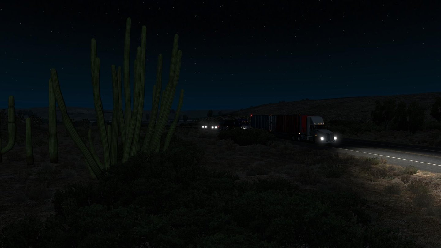 American Truck Simulator Im Vordergrund Kakteen, am Himmel tausende von Sternen, bisweilen auch Sternschnuppen: Die Wüste hat nachts besonderen Reiz.
