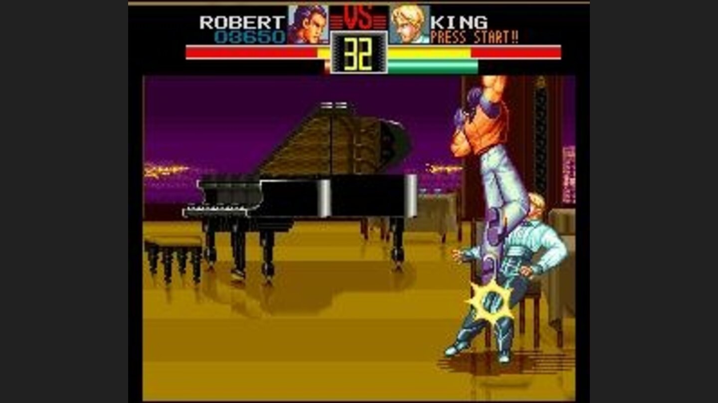 Robert finishing off King. If you beat her with a special move, her shirt will rip off!