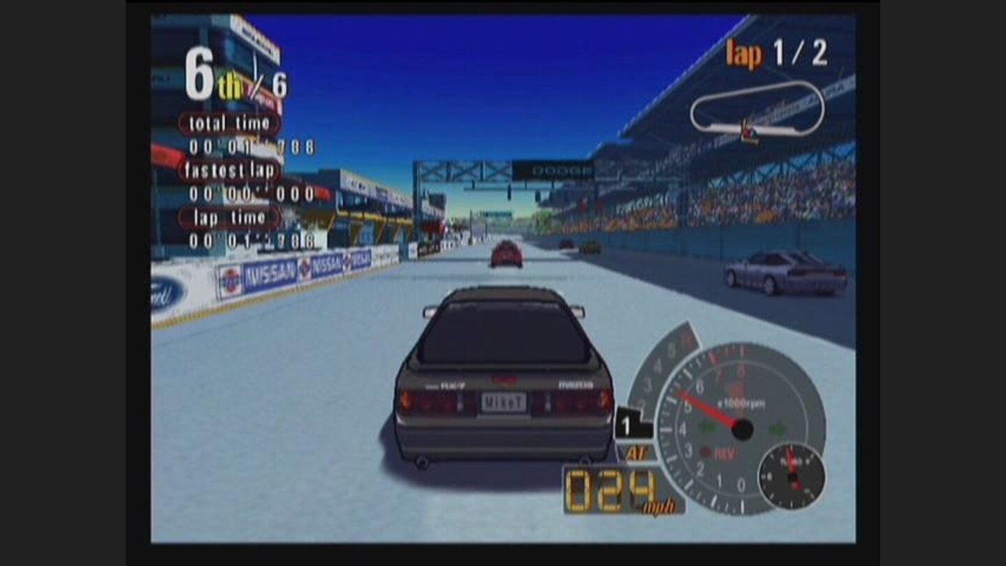 The beginning of a race at a speedway.