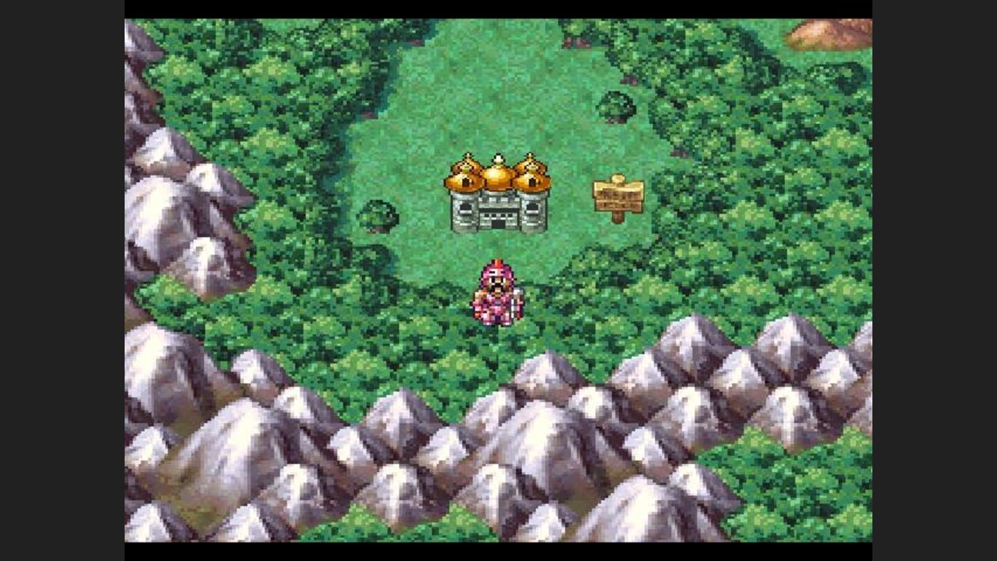 Ryan is standing outside his castle, looking quite silly