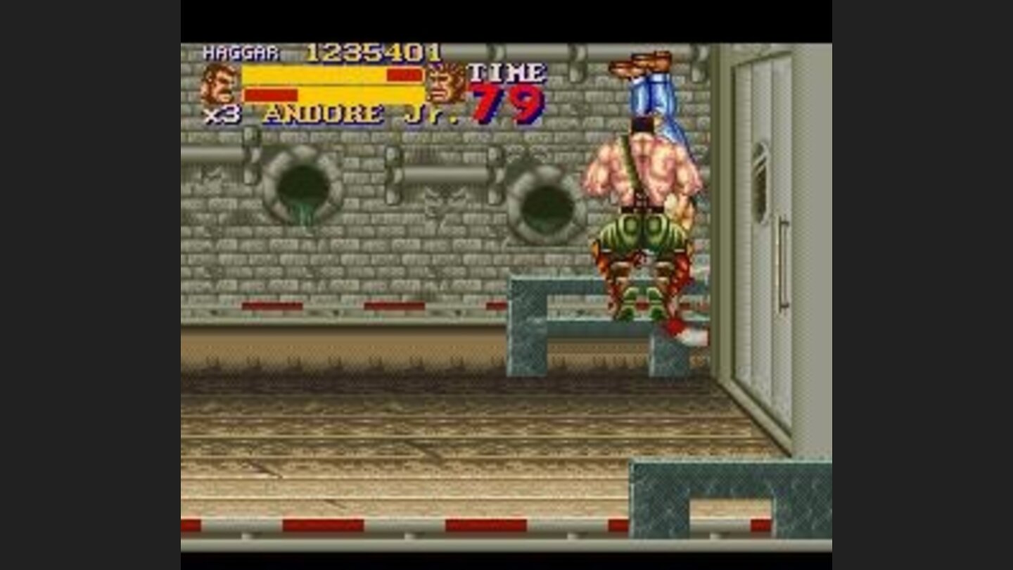 Haggar performing a spinning pile driver