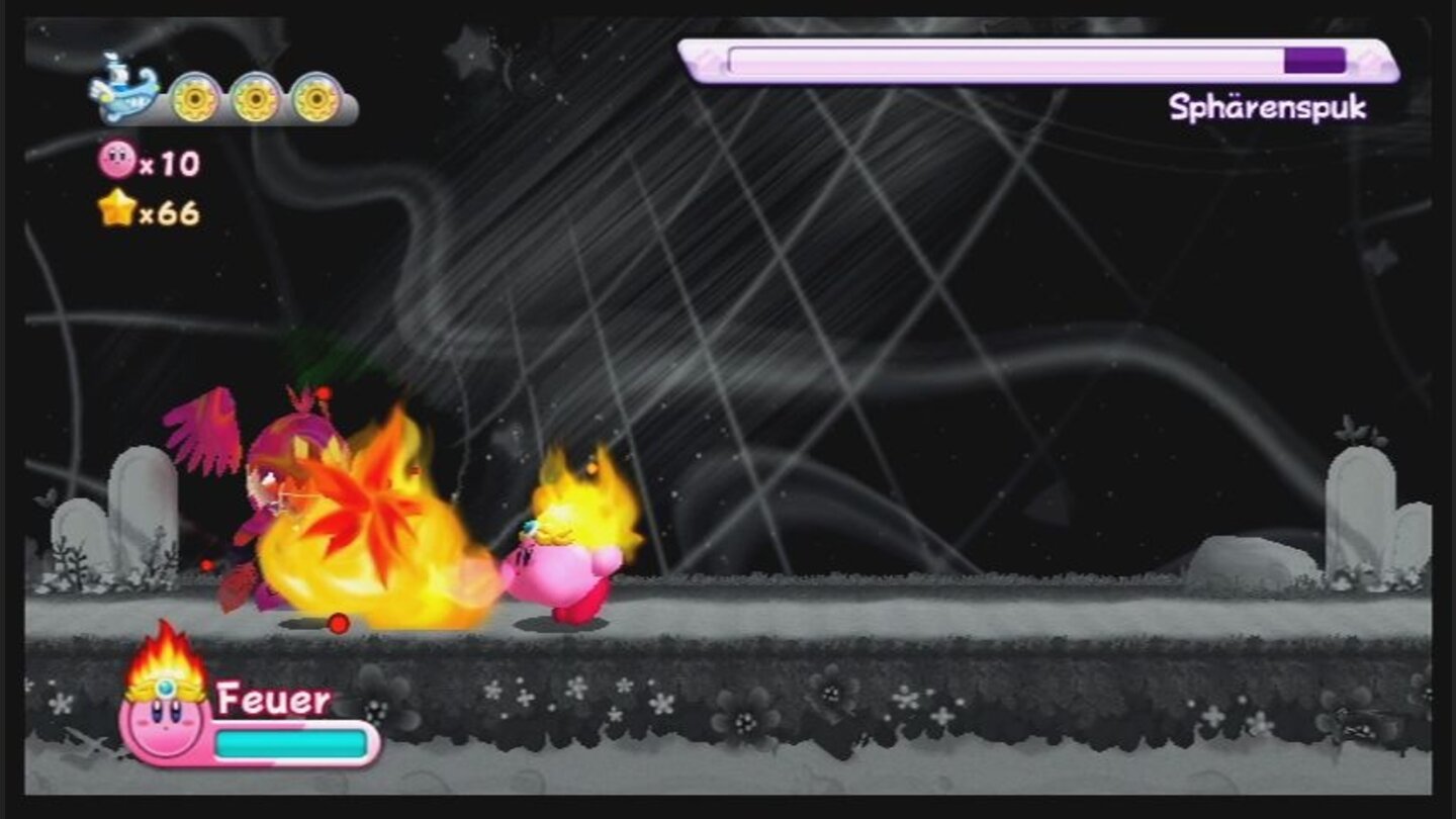 Kirbys Adventure WiiBossgegner lassen sich am einfachsten mit einer von Kirbys Spezialfähigkeiten erledigen, so wie hier mit der Feuerkraft.