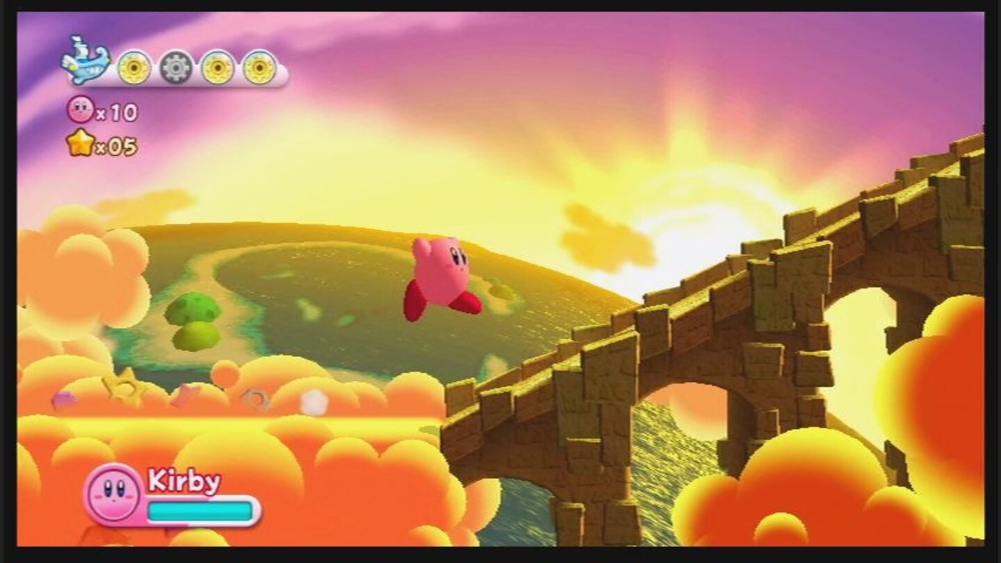 Kirbys Adventure WiiEs hüpft sich doch gleich viel angenehmer durch die prächtigen Wolken, wenn im Hintergrund die Sonne majestätisch untergeht.