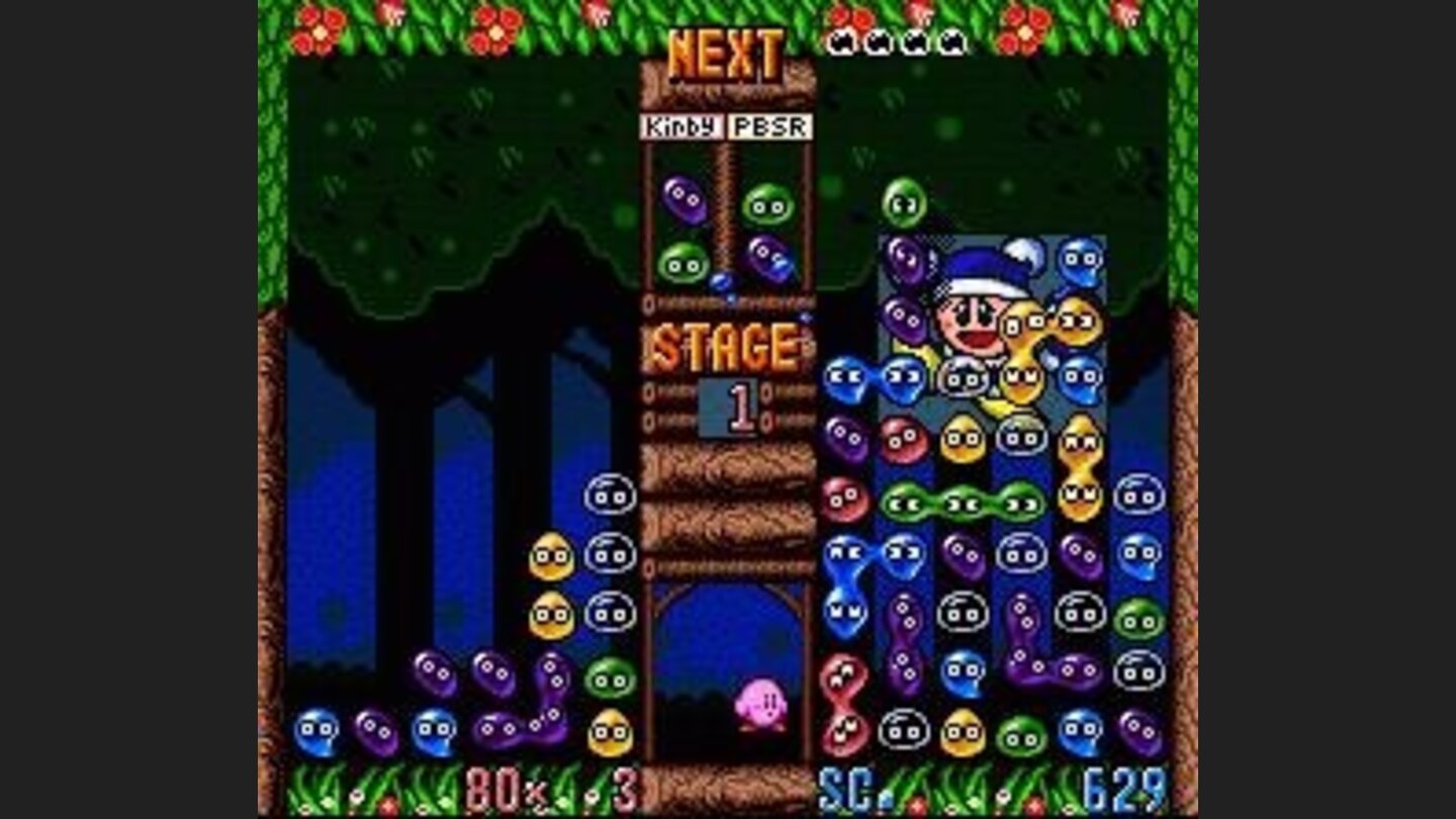Gameplay against the computer; you lose the game when the bubbles reach the top row on your side of the screen. Here its me who is winning