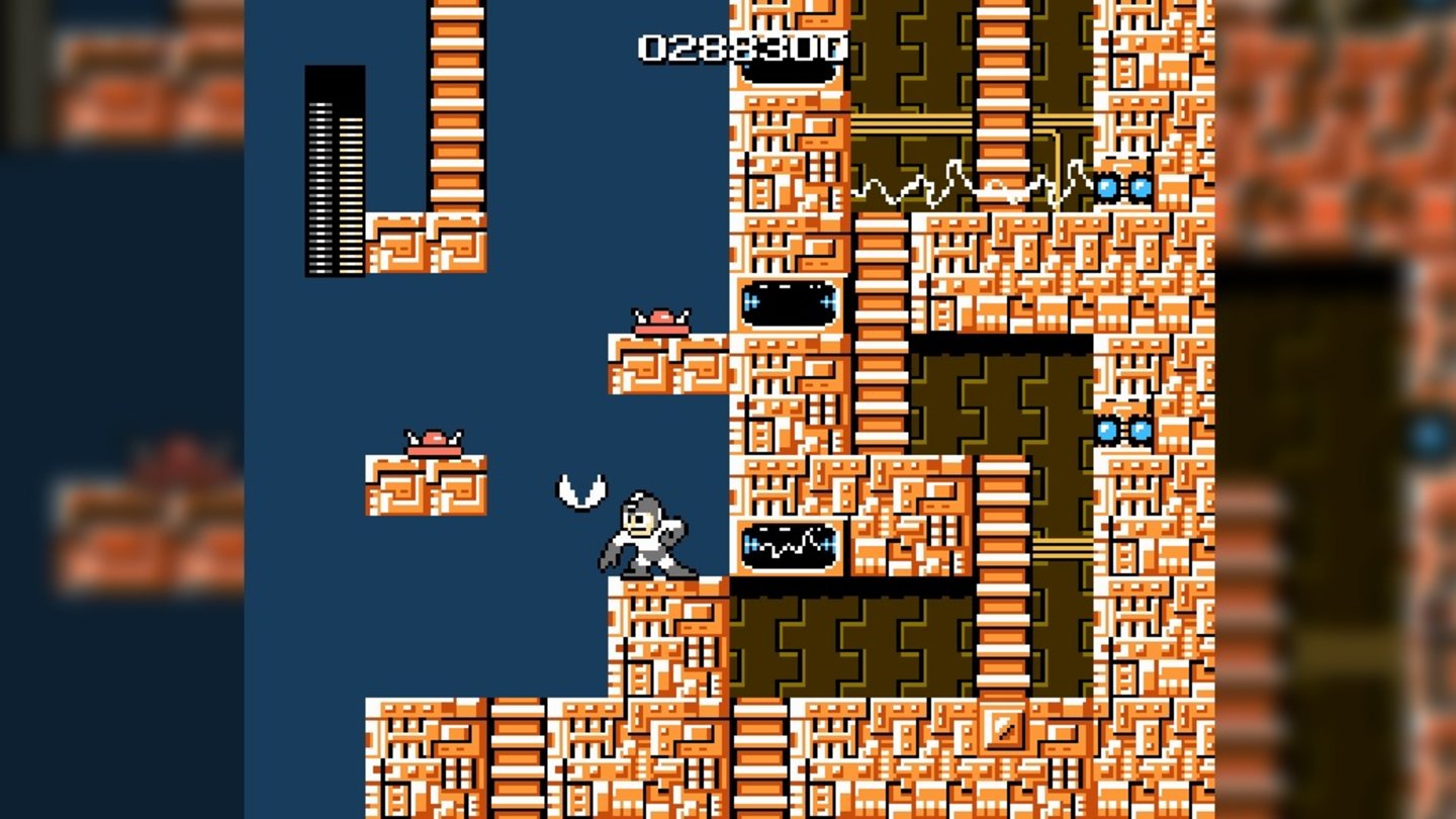 Mega ManMit Cutmans Klingen schnippeln wir uns den Weg frei, denn die orangenen Stolperfallen lassen sich mit der Standardwaffe nicht zerstören.