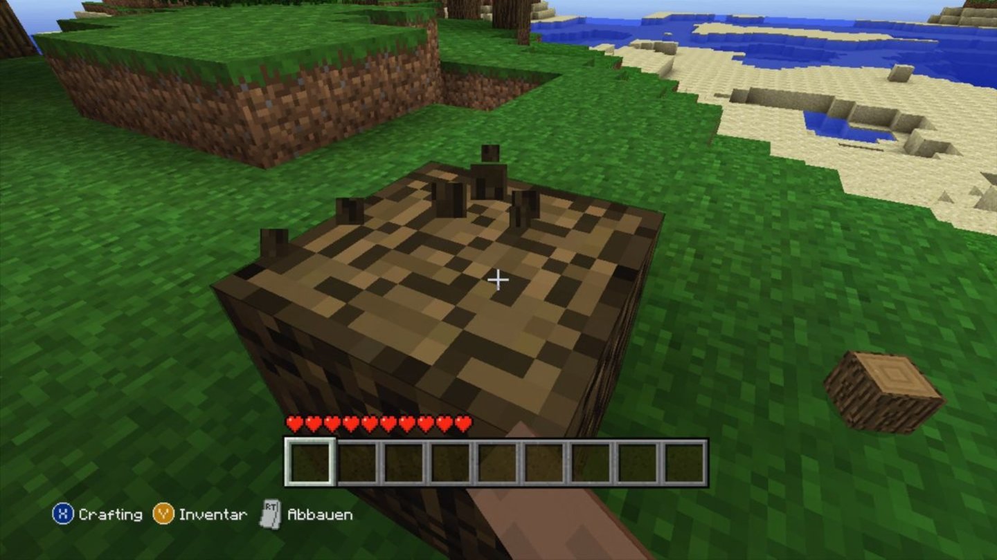 Minecraft: Xbox 360 EditionDamit fängt jeder Minecraft-Level an: Wir dreschen auf einen Baum ein, um Holz zu ernten.