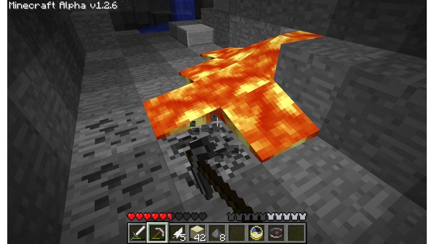 MinecraftTief unter der Erde fließt Lava, außerdem warten Bodenschätze wie dieses Kohleflöz.