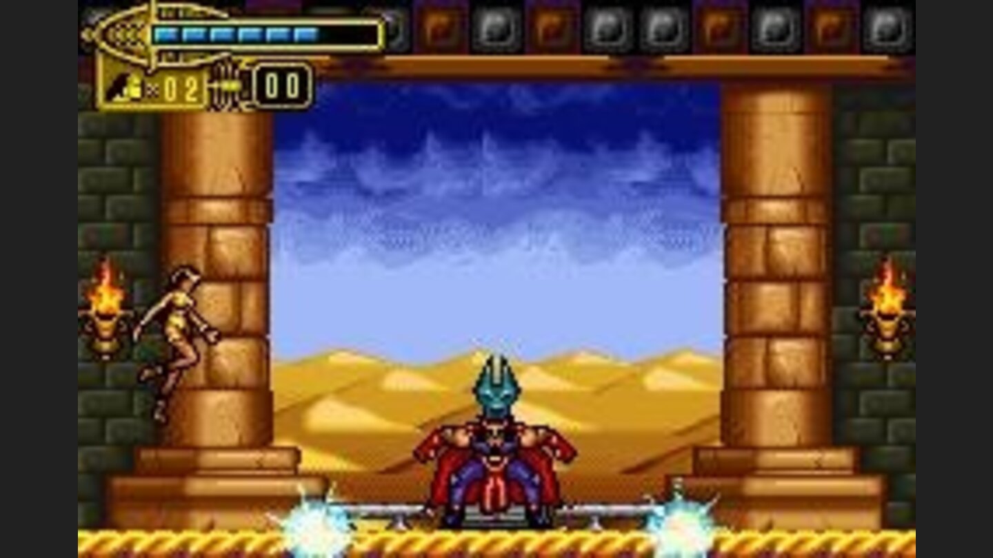 He will attack of diverse forms: in the first one (making this very quaint pose), energy balls will cross the screen in both sides. Jump them and youll be safe.