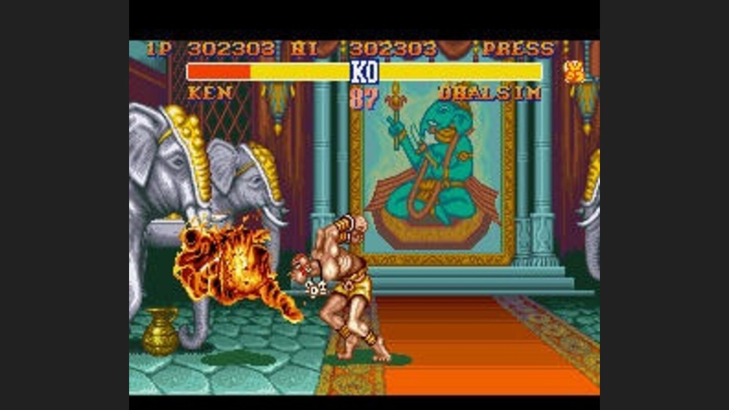 Dhalsim sets Ken on fire with his yoga flame