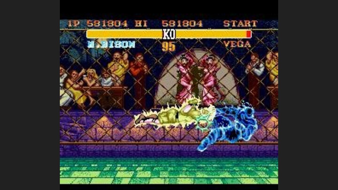 Bisons Psycho Crusher in action, hitting (and burning) Vega.