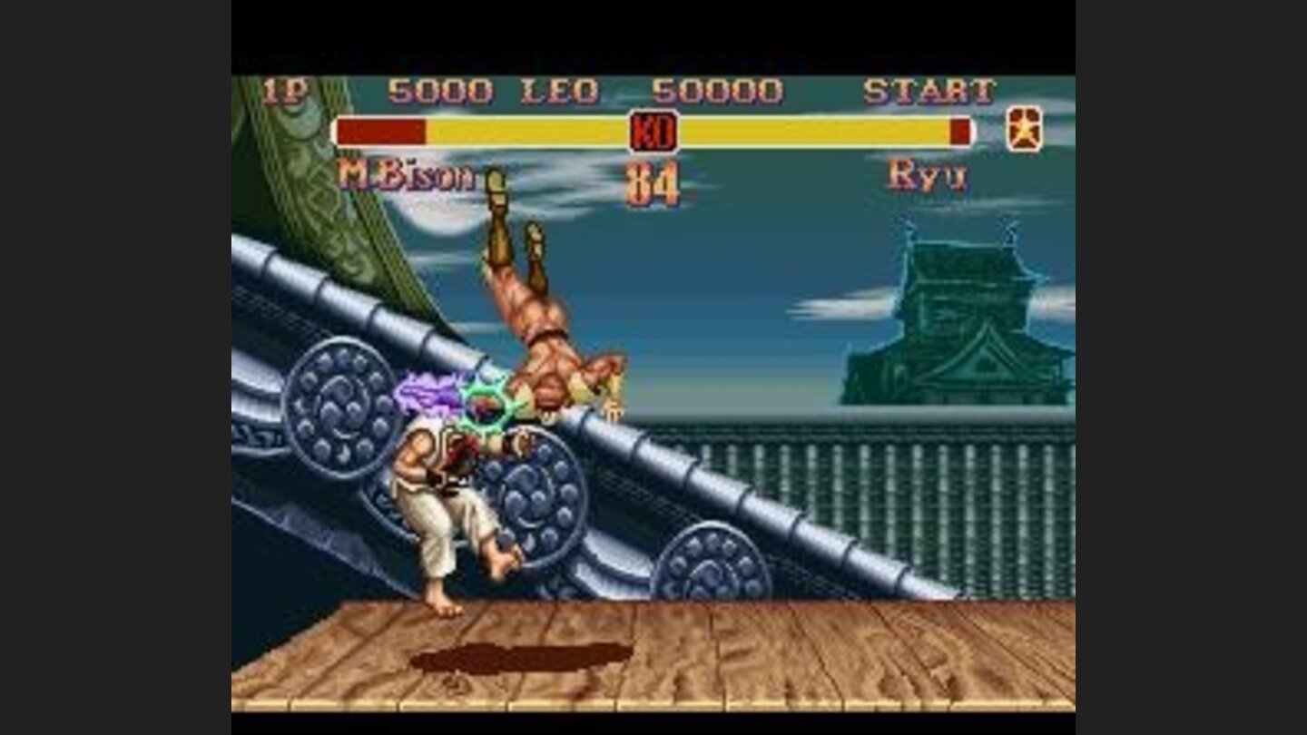 Ryu being damaged by M. Bisons Flying Psycho Fist.