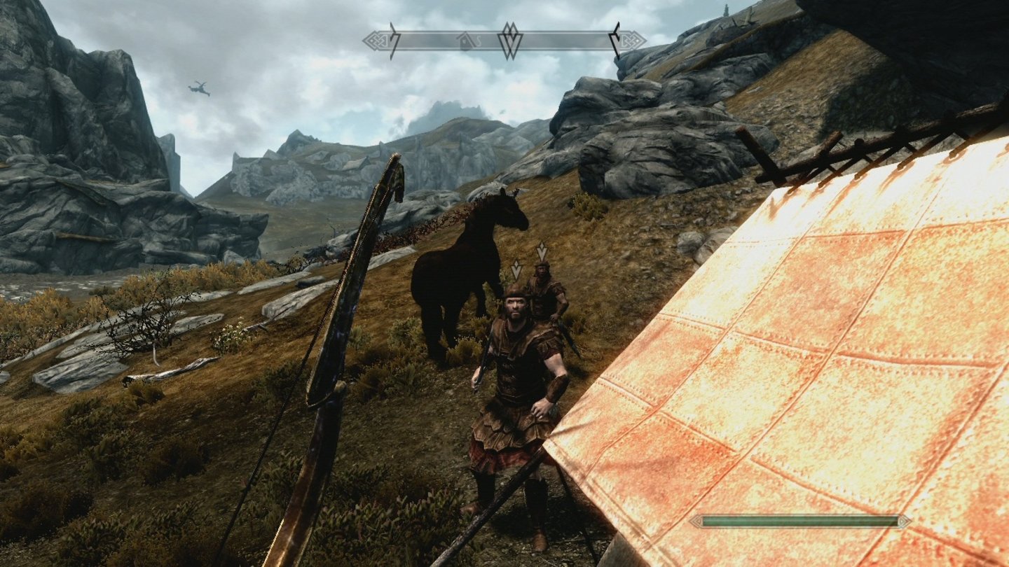 The Elder Scrolls 5: Skyrim (Xbox 360)Vorne kaiserliche Soldaten, hinten ein (ferner) Drache.