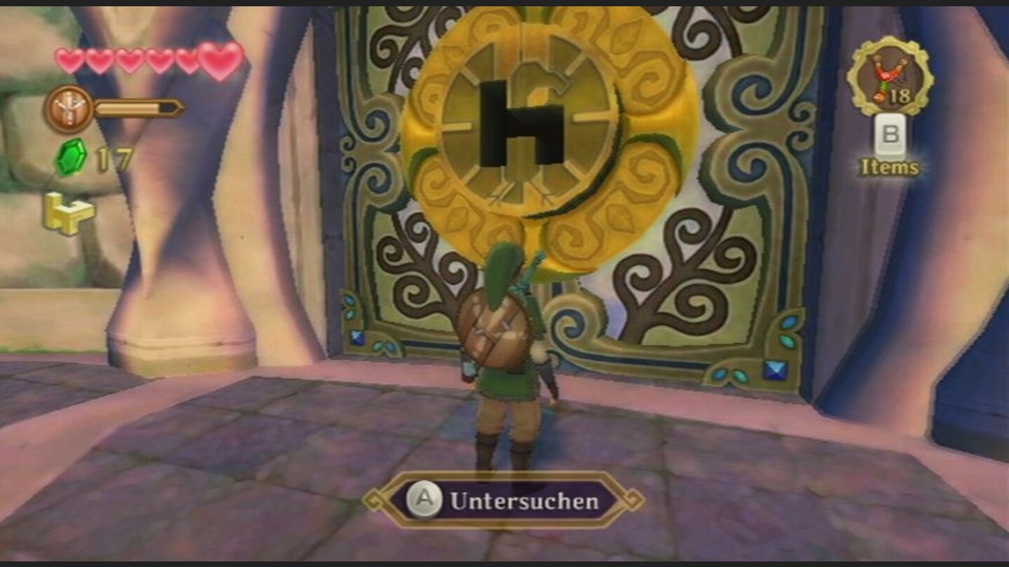 Mit der WiiMote dreht und wendet ihr den Schlüssel so lange, bis er ins Schloss passt.