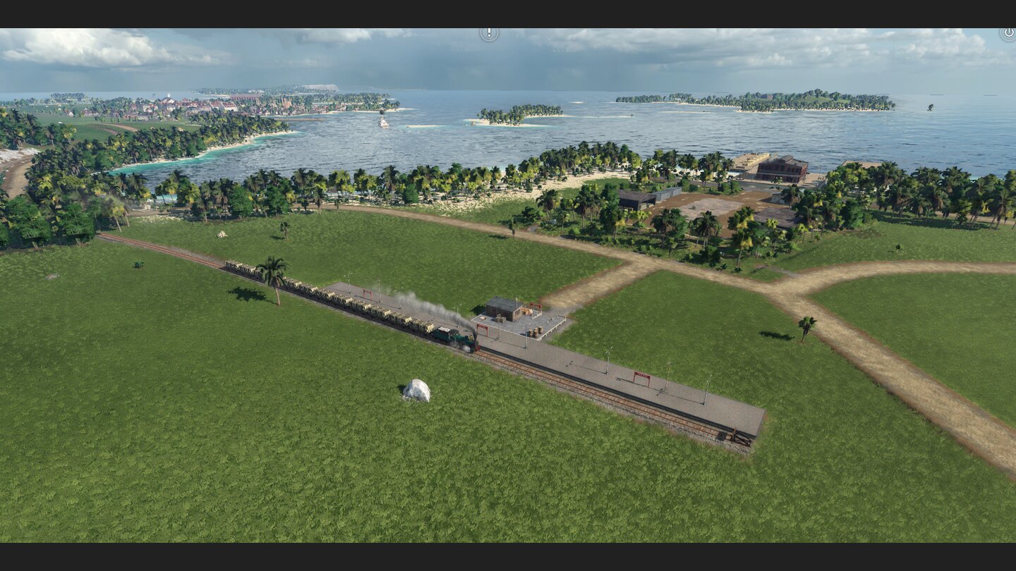 Transport Fever 2Ein Zug liefert Baumstämme vom Holzfällerbetrieb zum Sägewerk im Hintergrund, wo Bretter gefertigt werden.