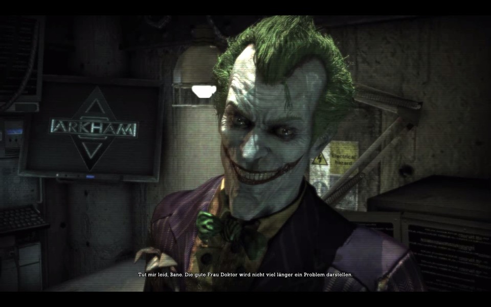 Der Joker meldet sich bei Batman immer mal wieder über einen der zahlreichen Monitore in der Arkham Anstalt.