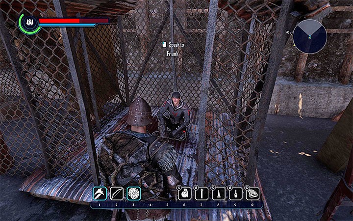 Frank, der Akolyth, wird in einem der Käfige gefangen gehalten.