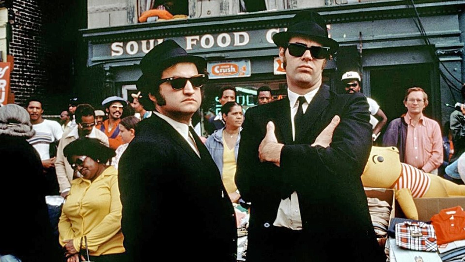 In Die Blues Brothers waren John Belushi (links, hier mit Filmbruder Dan Aykroyd) im Auftrag des Herren unterwegs. 