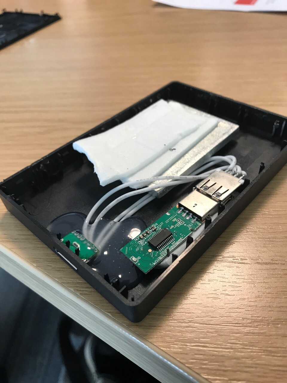 In the interior of a cheap fake USB hard drive (source: Reddit)